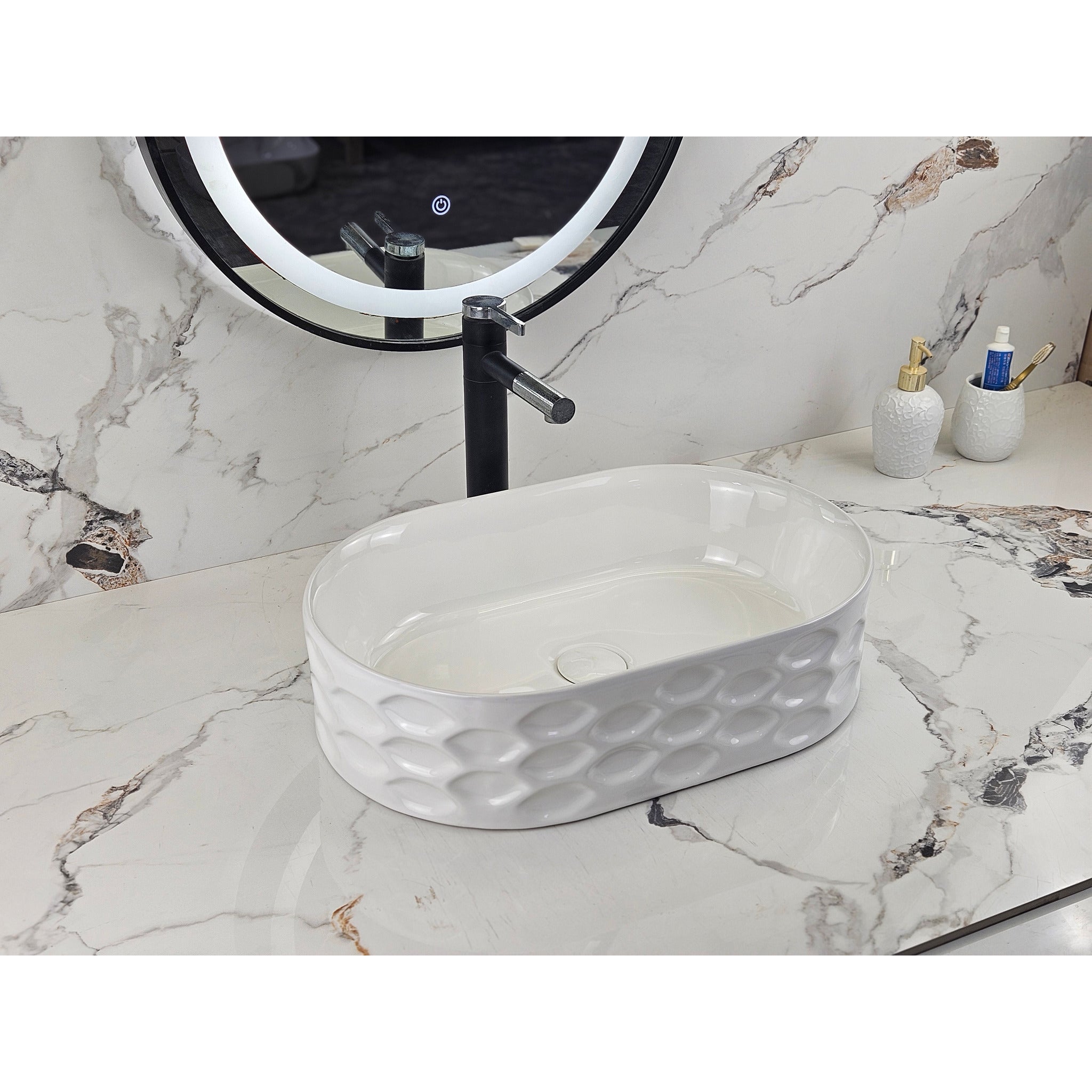 Infinity IA103 oval textured gloss white basin with black tapware, front angled view