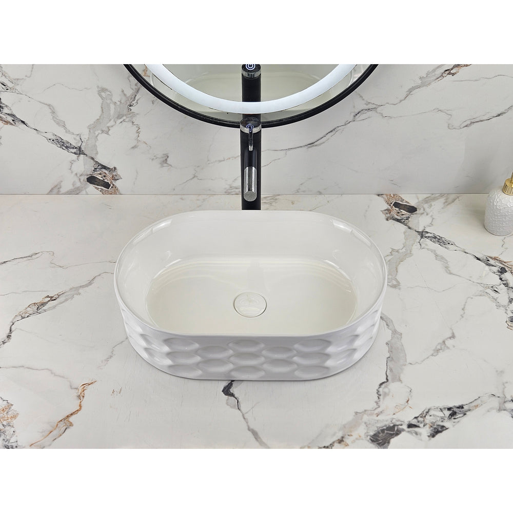 Infinity IA103 oval textured gloss white basin with black tapware, front view