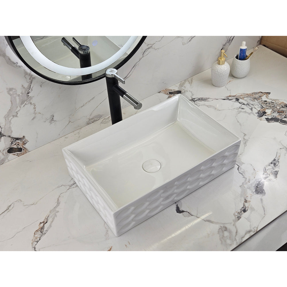 Infinity IA104 rectangular textured gloss white basin with black tapware, left angled view
