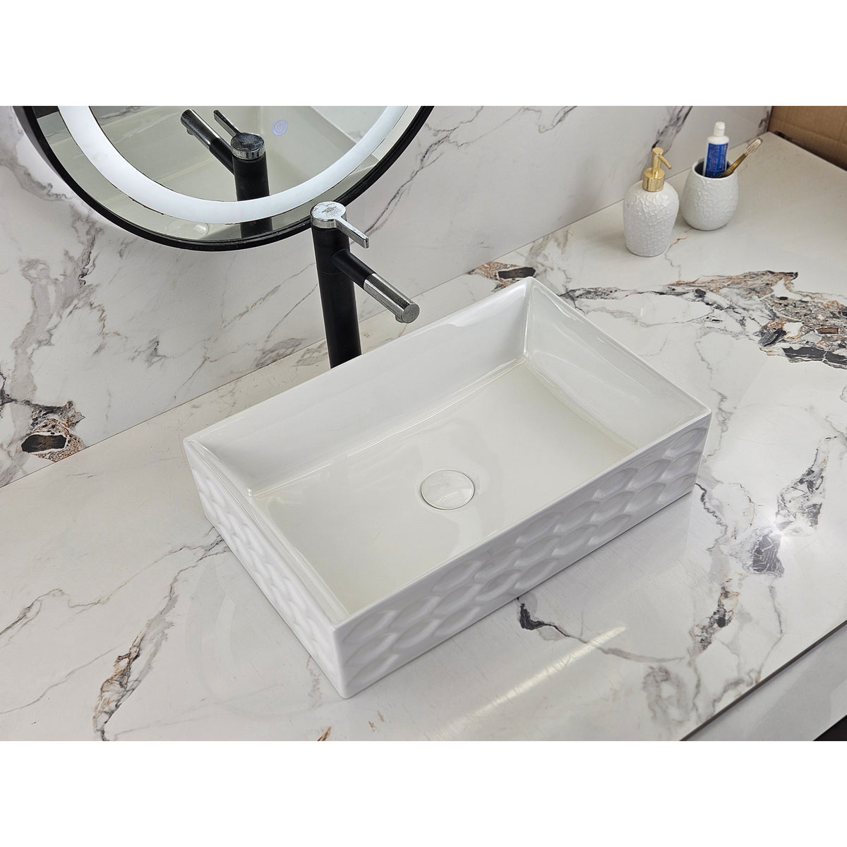 Infinity IA104 rectangular textured gloss white basin with black tapware, left angled view