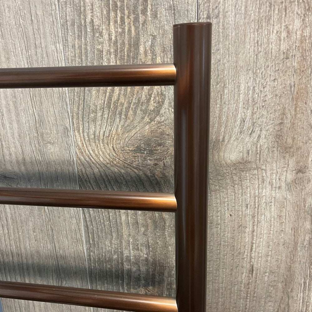 RADIANT HEATING 7-BARS ROUND HEATED TOWEL RAIL OIL RUBBED BRONZE 600MM |  Austpek Bathrooms
