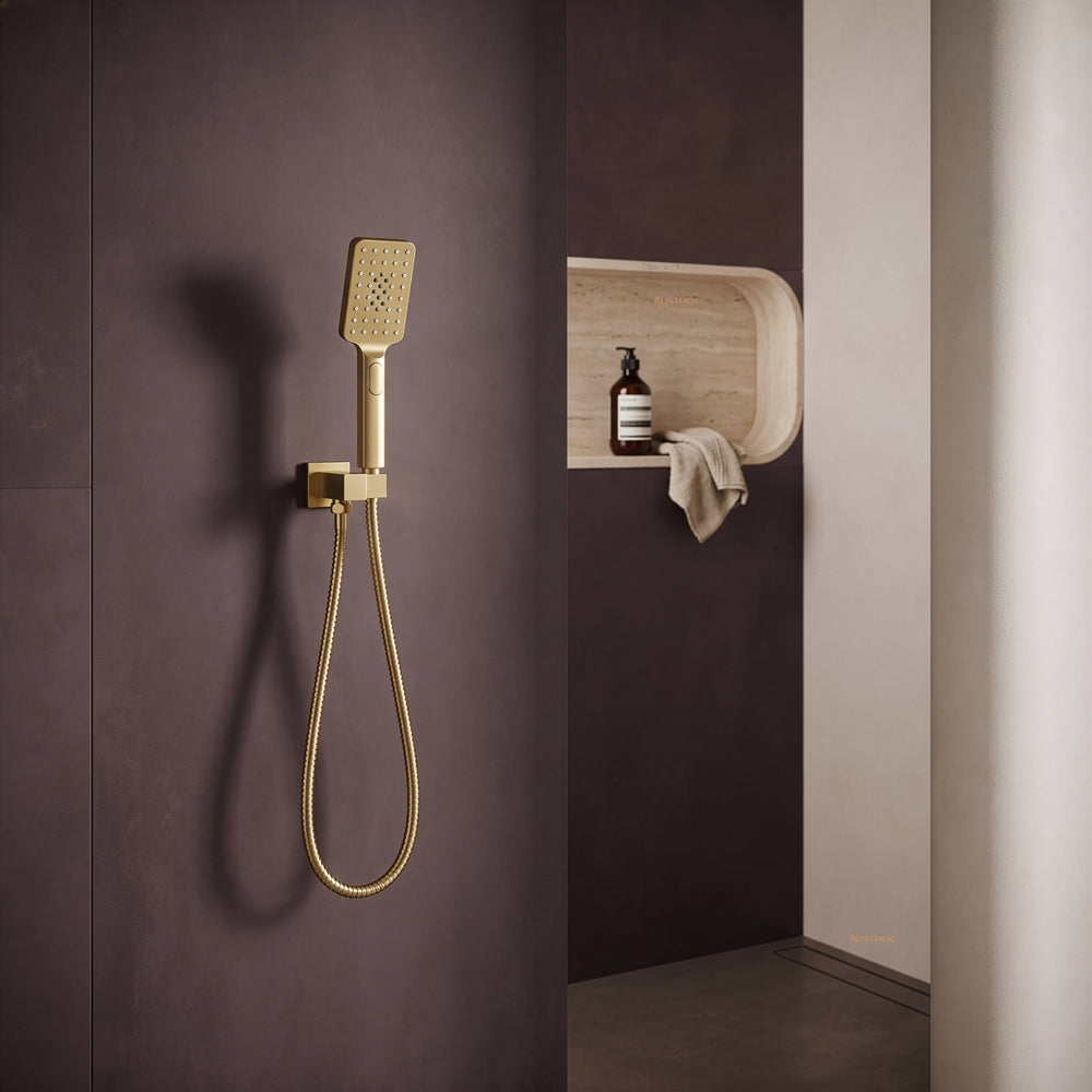 Ikon eden hand shower on wall outlet bracket 299mm brushed gold