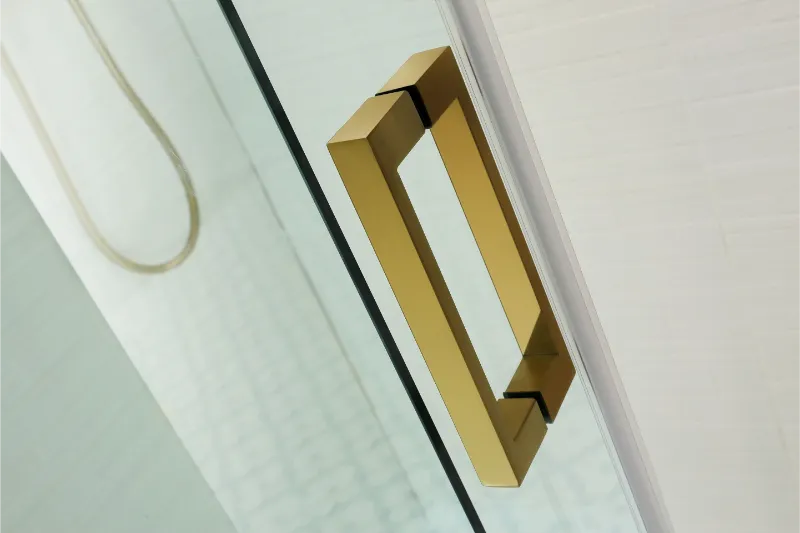 COVEY WALL TO WALL FRAMELESS SINGLE SLIDING DOOR BATH SCREEN BRUSHED GOLD