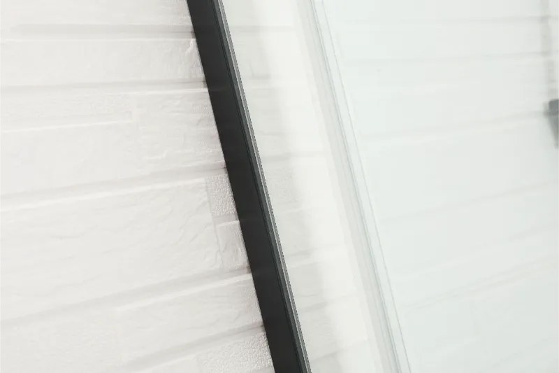 COVEY WALL TO WALL FRAMELESS SINGLE SLIDING DOOR BATH SCREEN MATTE BLACK