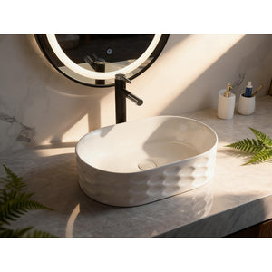 Infinity IA103 oval textured gloss white basin styled on a marble vanity