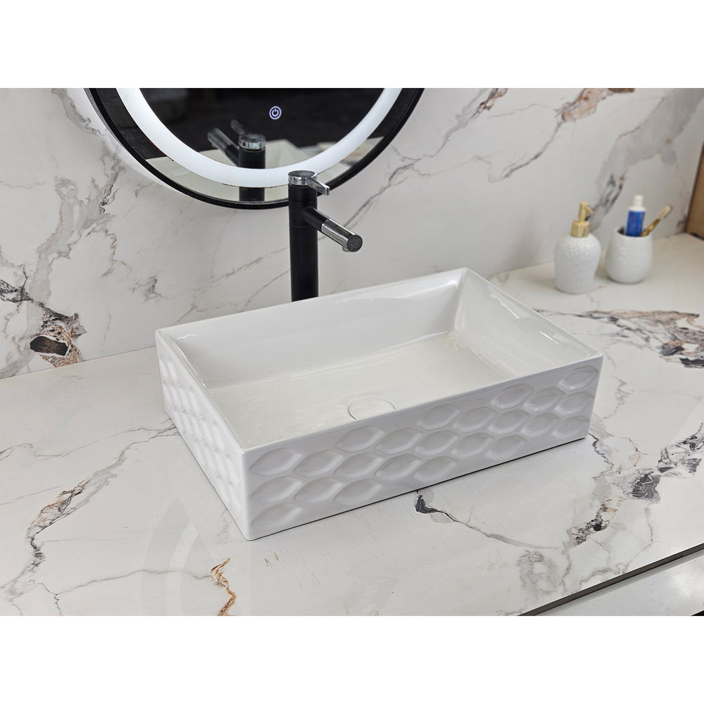 Infinity IA104 rectangular textured gloss white basin with black tapware, front angled view