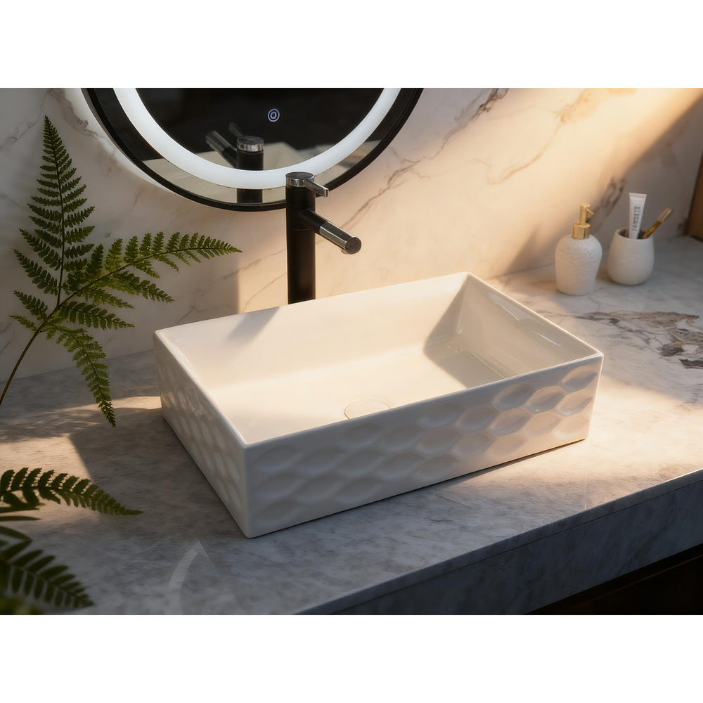 Infinity IA104 rectangular textured gloss white basin styled on a marble vanity