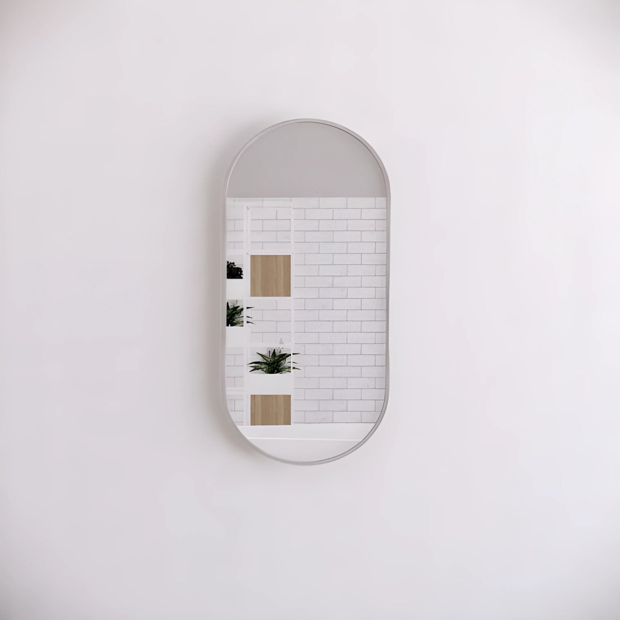 RIVA FRAMED OVAL MIRROR WALL MOUNTED BRUSHED NICKEL 450X900MM