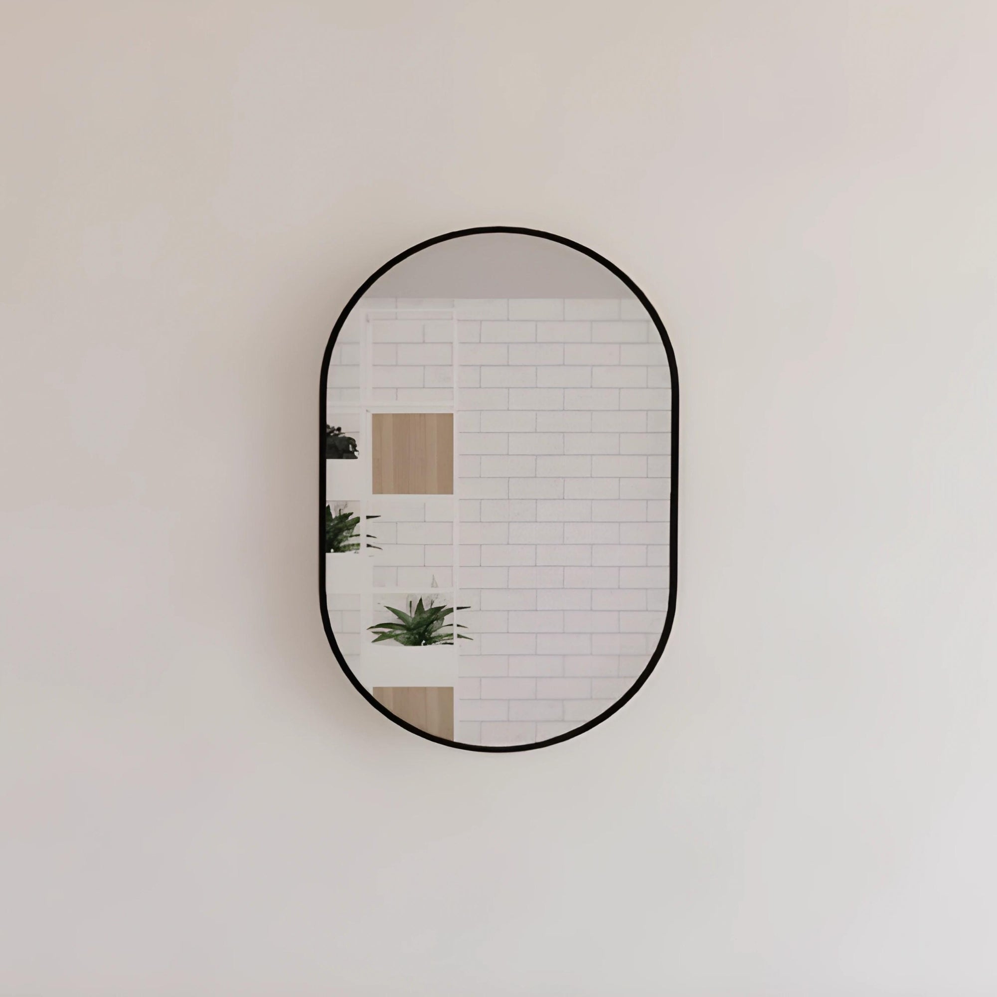 RIVA FRAMED OVAL MIRROR WALL MOUNTED BLACK 900X600MM