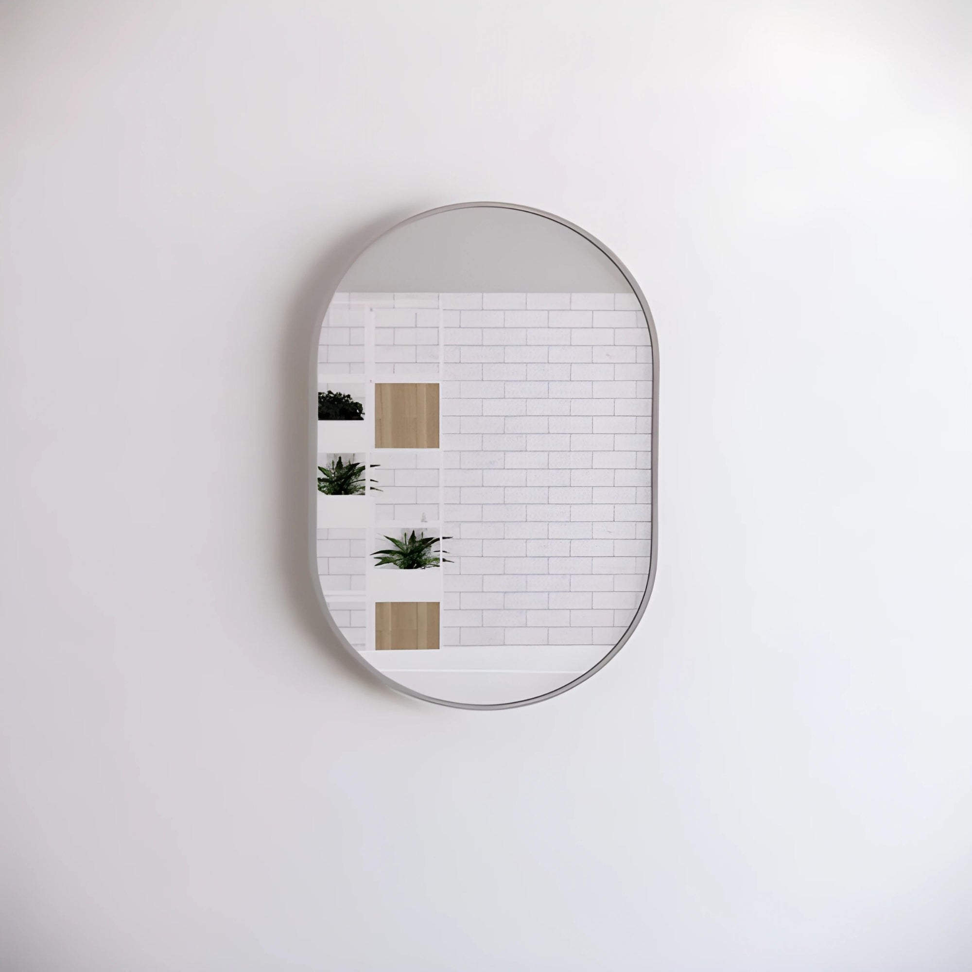 RIVA FRAMED OVAL MIRROR WALL MOUNTED BRUSHED NICKEL 900X600MM