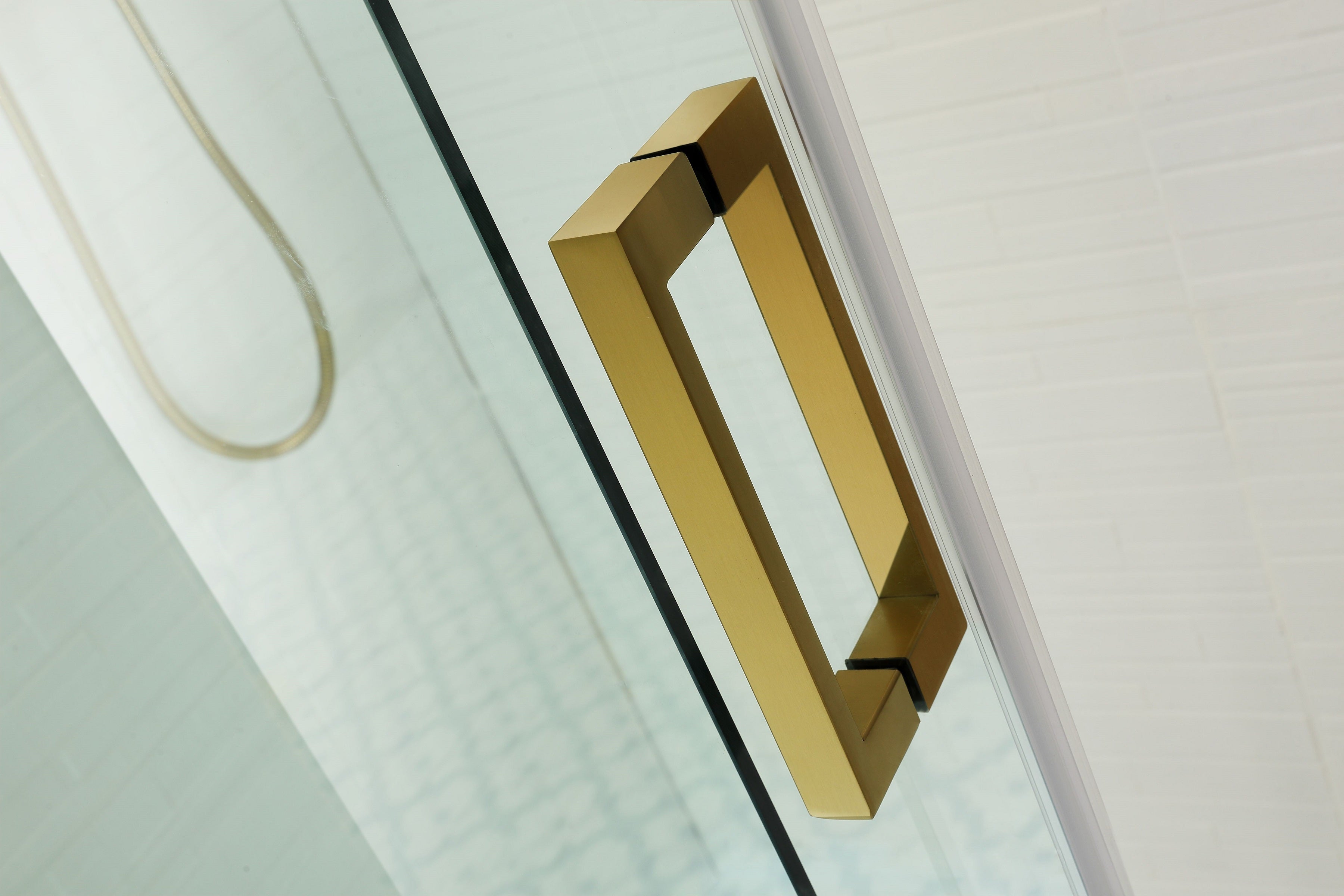 COVEY WALL TO WALL FRAMELESS SLIDING DOOR BRUSHED GOLD