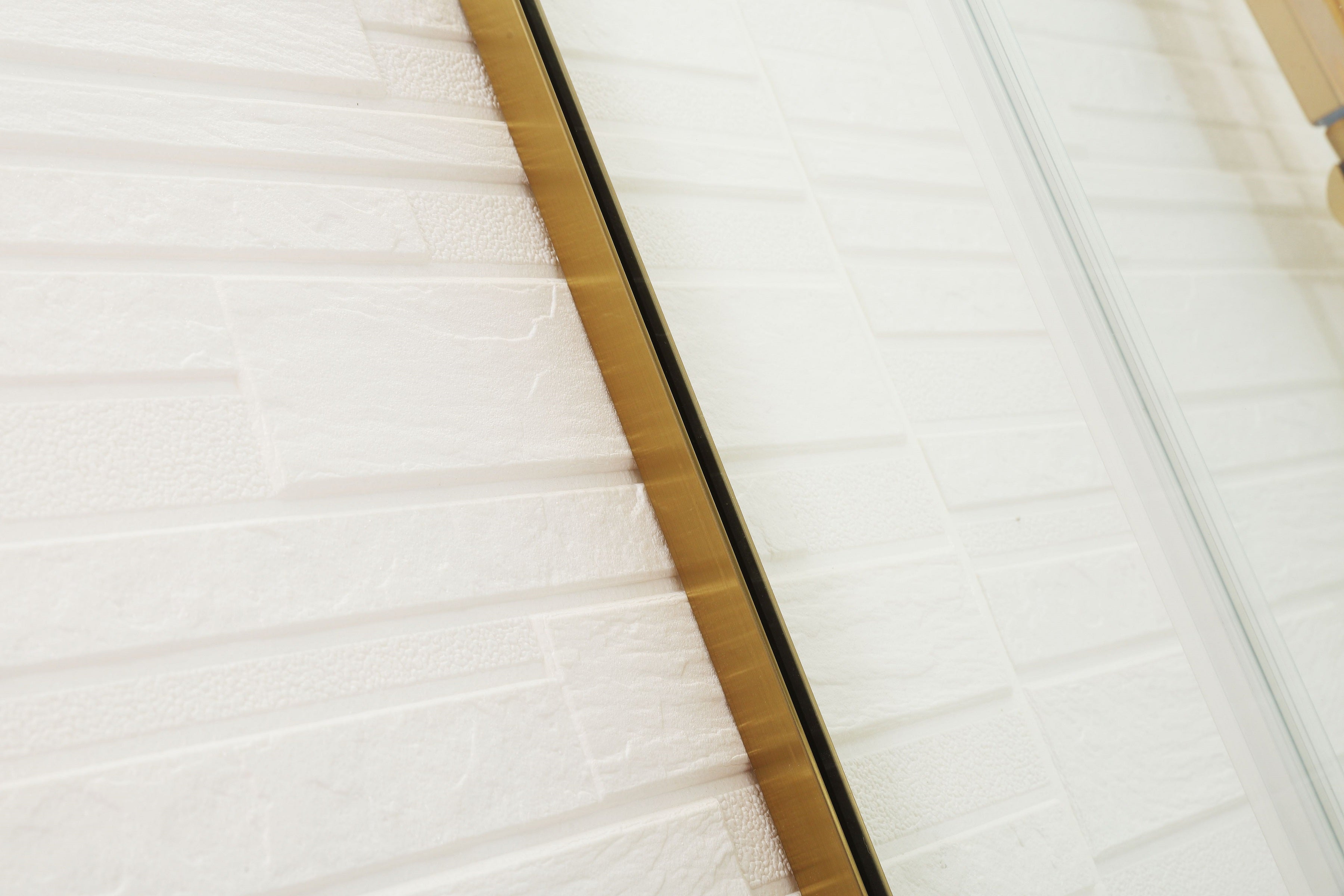 COVEY WALL TO WALL FRAMELESS SLIDING DOOR BRUSHED GOLD